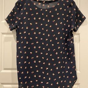 Geometric patterned blouse with pocket detail